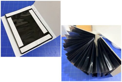 連結したポケットの束を新しい表紙の台紙に固定する様子